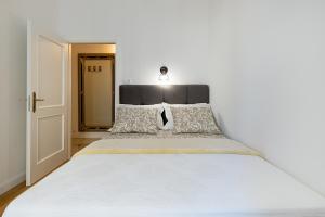 Posteľ alebo postele v izbe v ubytovaní Aurelia Residence