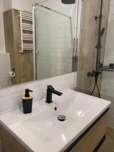 Kúpeľňa v ubytovaní BALTICUS Promenada Gwiazd 14 A apartament 78