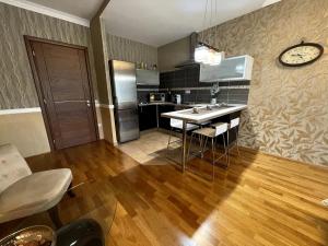 Kuchyň nebo kuchyňský kout v ubytování Apartment 122 Čertovka