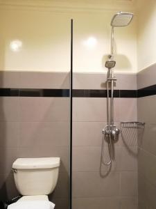 Een badkamer bij StayInn Gateway Hotel Apartment