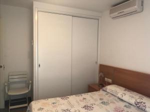 Posteľ alebo postele v izbe v ubytovaní Platja del Port