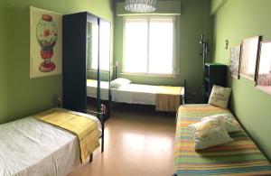 Posteľ alebo postele v izbe v ubytovaní Emozione Marina - appartamento fronte mare