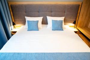 Posteľ alebo postele v izbe v ubytovaní BEL MARE Apartament C202 PARKING GRATIS + 10 fotografií