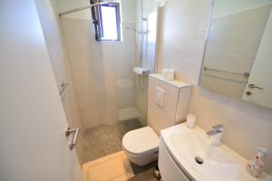 Koupelna v ubytování Apartments Šimić