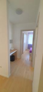 Postel nebo postele na pokoji v ubytování Apartman Galija 1
