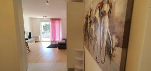 Postel nebo postele na pokoji v ubytování Apartman Galija 1