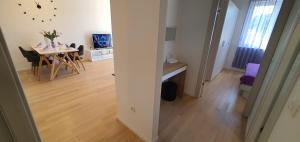 TV a/nebo společenská místnost v ubytování Apartman Galija 1