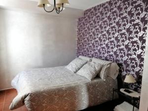 Postel nebo postele na pokoji v ubytování La Roca de Setenil