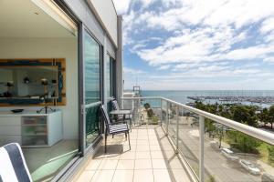 a balcony with a view of the ocean at Geelong Waterfront Penthouse Apartment in Geelong