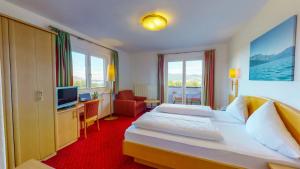 Hotel Haberl - Attersee客房内的一张或多张床位