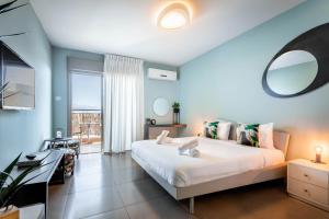 Postel nebo postele na pokoji v ubytování Almogim Suites Eilat Hotel + 37 fotografií