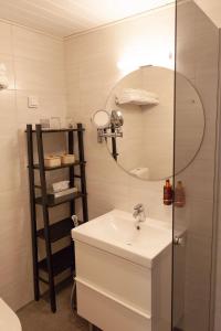 Kylpyhuone majoituspaikassa Apartment Lumikontupa