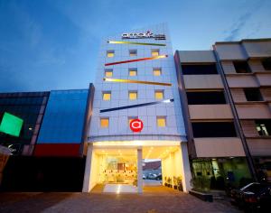 a building with a sign on top of it at Amaris Hotel Cilegon in Cilegon