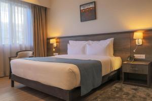 Eka Hotel Eldoret客房内的一张或多张床位