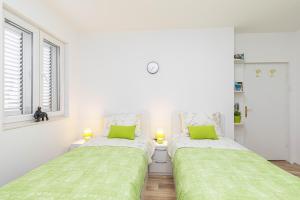 Posteľ alebo postele v izbe v ubytovaní Apartment ASTRID 5 m from BEACH