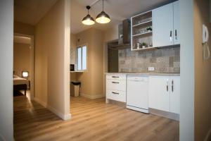 Kuchyňa alebo kuchynka v ubytovaní Santo Tomás A Ha Apartment + 19 fotografií
