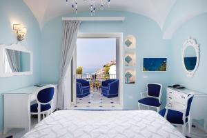 Postel nebo postele na pokoji v ubytování Villa Fiorentino + 37 fotografií