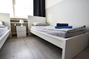 Llit o llits en una habitació de Easy Apartments Work and Stay Cologne