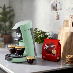 a coffee maker on a counter with two cups of coffee at Château De Saint-Maixant in Saint-Maixant