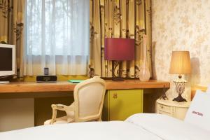 Postel nebo postele na pokoji v ubytování 25hours Hotel The Goldman