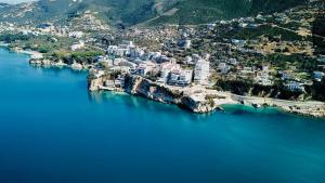 an aerial view of a city on the water at Noa Apartments in Vlorë