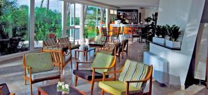a restaurant with a bunch of chairs and tables at Torre Del Sole in Terracina