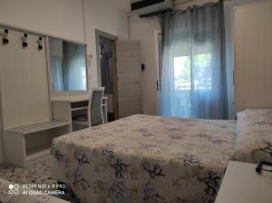 Voodi või voodid majutusasutuse Hotel Vianello toas