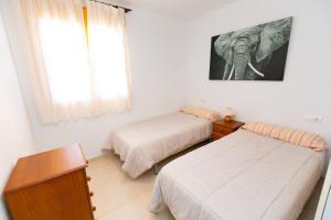Postel nebo postele na pokoji v ubytování Ambar Beach Morpar Calp + 37 fotografií