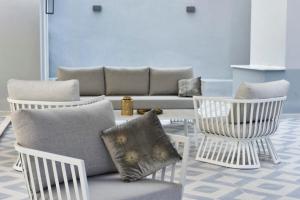 Posedenie v ubytovaní Boutique Hotel de la Ville