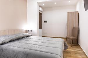 Posteľ alebo postele v izbe v ubytovaní Casa Vacanze del Corso