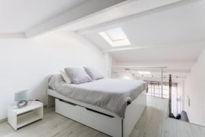 Katil atau katil-katil dalam bilik di Studio meublé
