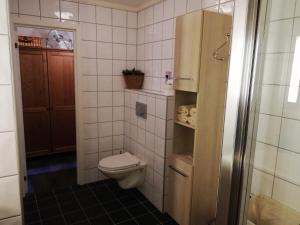 Ett badrum på Løvheim Gjestehus