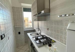 A kitchen or kitchenette at HOME SALENTO