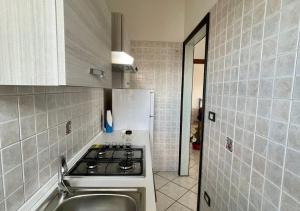 A kitchen or kitchenette at HOME SALENTO