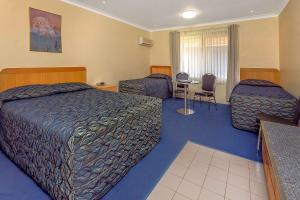 Ein Bett oder Betten in einem Zimmer der Unterkunft Comfort Inn Bay of Isles