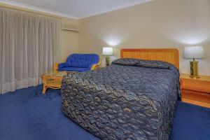 Ein Bett oder Betten in einem Zimmer der Unterkunft Comfort Inn Bay of Isles