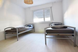Istumisnurk majutusasutuses Work and Stay Apartment in Troisdorf