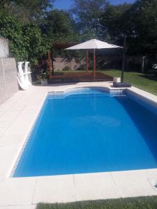 Swimmingpoolen hos eller tæt på Casa Quinta en Luján - Olivera