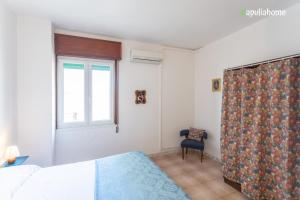 Posteľ alebo postele v izbe v ubytovaní Appartamento lungomare con vista - Gallipoli