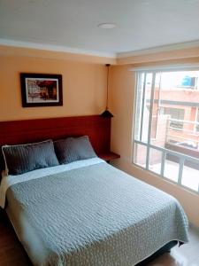 Postel nebo postele na pokoji v ubytování Hotel VIYAJE