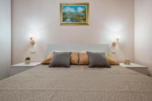 A bed or beds in a room at Alghermanzoni
