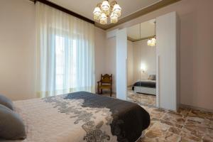 A bed or beds in a room at Alghermanzoni