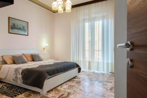 A bed or beds in a room at Alghermanzoni