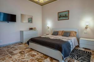A bed or beds in a room at Alghermanzoni