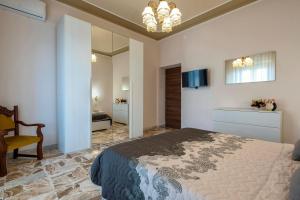 A bed or beds in a room at Alghermanzoni
