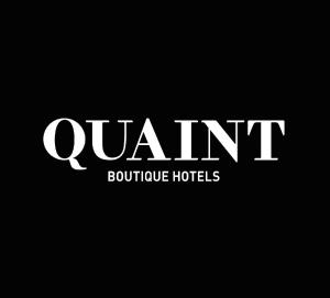 a sign that reads quant lecture huts at Quaint Boutique Hotel Sannat in Sannat