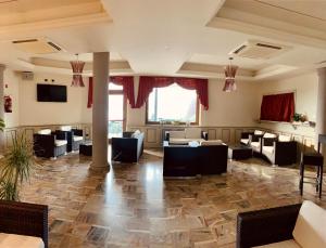 TV a/nebo společenská místnost v ubytování Hotel Saligari