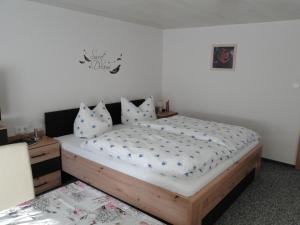 Cama ou camas em um quarto em Haus Angermann
