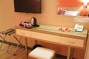 TV a/nebo společenská místnost v ubytování Hotel Balik Pulau