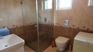 Koupelna v ubytování Apartments Vabec + 40 fotografií